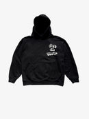 Front view of KIBISHI’s Life is Grim hoodie — black heavyweight streetwear hoodie with white graffiti-style chest print, kangaroo pocket, and oversized hood.