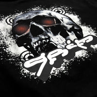 Close-up of the back graphic on the Life is Grim hoodie by KIBISHI — featuring a bold skull illustration with red-tinted eyes and graffiti-style text, printed on heavyweight French terry fabric.